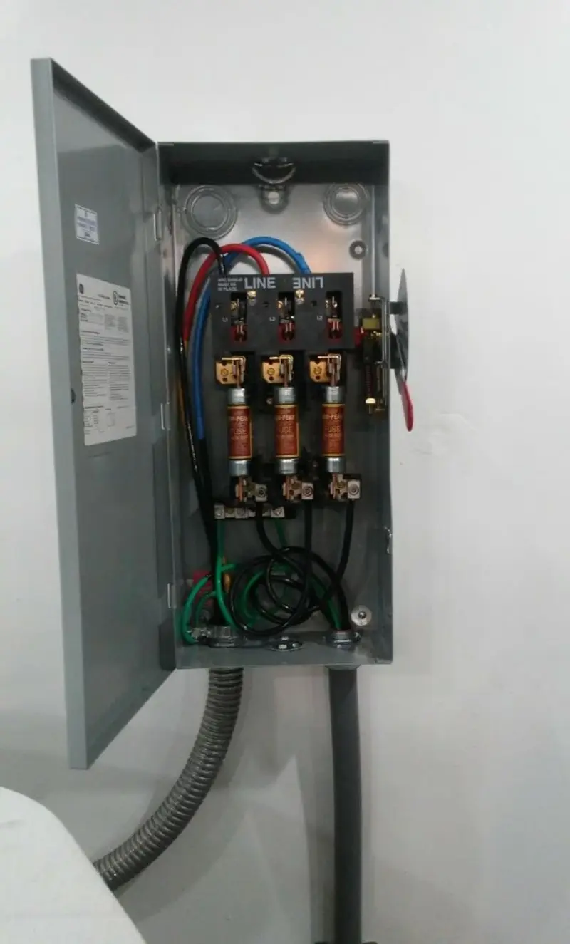 Three-phase disconnect switch installed for Smoke Detector Installation in Wamego